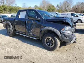 2015 Ram 1500 Rebel z VIN 1C6RR7YT7FS771791, wystawiony jako Copart lot #49873094 z przebiegiem 119 875 mil mil oraz Szkoda całkowita • Salvage title. Historia ofert i sprzedaży dostępna na DreamBid. Obrazek 4.