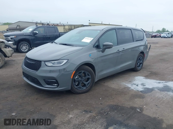 2022 Chrysler Pacifica Hybrid Limited with VIN 2C4RC1S74NR212475, listed as a IAAI auction lot 42264228 with 48,839 mi miles and . Bid and sale history available at DreamBid. Image 2.