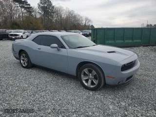 2020 Dodge Challenger SXT with VIN 2C3CDZAG9LH206682, listed as a Copart auction lot 80694704 with 63,275 mi miles and Salvage Title. Bid and sale history available at carsss.com. Image 4.