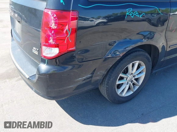 2014 Dodge Grand Caravan SXT with VIN 2C4RDGCG4ER341699, listed as a IAAI auction lot 42064523 with 234,422 mi miles and . Bid and sale history available at DreamBid. Image 12.