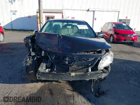 2012 Toyota Corolla L with VIN 2T1BU4EEXCC765204, listed as a IAAI auction lot 41706321 with 82,887 mi miles. Bid and sale history available at carsss.com. Image 12.