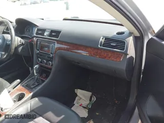 2013 Volkswagen Passat SEL Premium with VIN 1VWCM7A37DC024252, listed as a IAAI auction lot 41944978 with 168,616 mi miles. Bid and sale history available at carsss.com. Image 5.