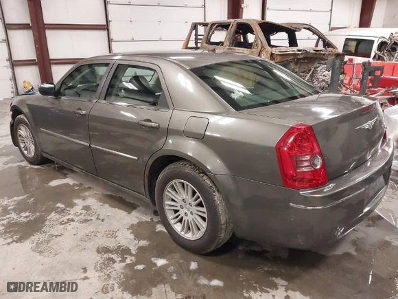 2008 Chrysler 300 Touring with VIN 2C3KA53G18H180306, listed as a IAAI auction lot 41514398 with 204,535 mi miles. Bid and sale history available at carsss.com. Image 3.