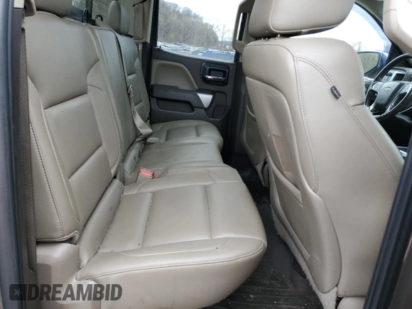 2014 Chevrolet Silverado 1500 LTZ with VIN 1GCVKSEC0EZ140325, listed as a Copart auction lot 52954845 with 128,231 mi miles and Salvage Title. Bid and sale history available at DreamBid. Image 10.