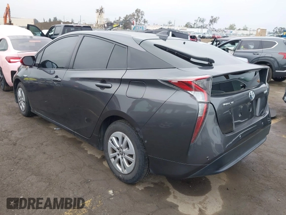 2018 Toyota Prius Two with VIN JTDKBRFUXJ3591956, listed as a IAAI auction lot 41848336 with 62,560 mi miles and . Bid and sale history available at DreamBid. Image 3.