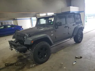 2016 Jeep Wrangler Unlimited Sport with VIN 1C4HJWDG4GL156724, listed as a Copart auction lot 62733795 with 100,602 mi miles and Salvage title. Bid and sale history available at DreamBid. Image 1.