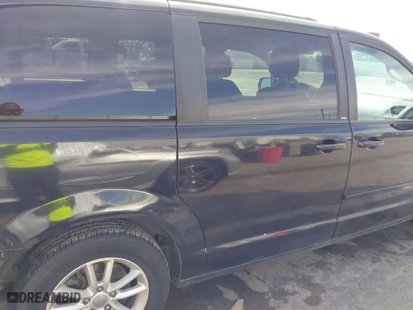 2014 Dodge Grand Caravan SXT 30th Anniversary with VIN 2C4RDGCG7ER122042, listed as a IAAI auction lot 41600892 with 101,596 mi miles. Bid and sale history available at carsss.com. Image 6.