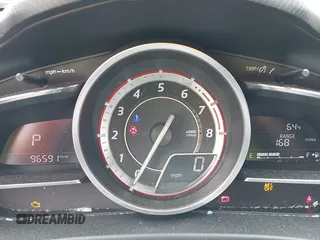 2014 Mazda 3 S Grand Touring with VIN JM1BM1M3XE1164610, listed as a IAAI auction lot 42421946 with 96,591 mi miles and . Bid and sale history available at DreamBid. Image 7.