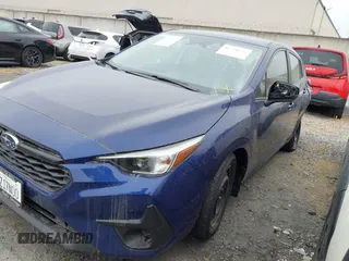 2025 Subaru Impreza z VIN JF1GUABC758210248, wystawiony jako IAAI lot #41798632 z przebiegiem 309 mil mil oraz . Historia ofert i sprzedaży dostępna na DreamBid. Obrazek 2.