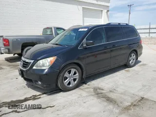 2008 Honda Odyssey Touring z VIN 5FNRL38908B092436, wystawiony jako Copart lot #59914655 z przebiegiem 186 462 mil mil oraz Szkoda całkowita • Salvage title. Historia ofert i sprzedaży dostępna na DreamBid. Obrazek 1.
