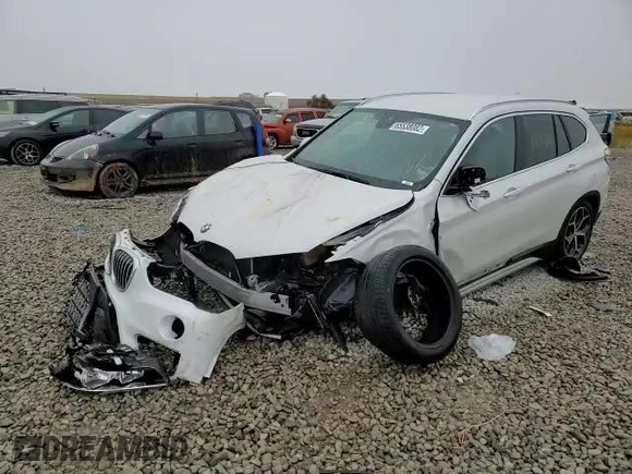 2019 BMW X1 sDrive28i with VIN WBXHU7C53K5L12037, listed as a Copart auction lot 65538082 with Not Provided miles and . Bid and sale history available at DreamBid. Image 11.