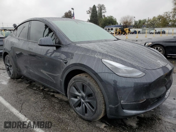 2025 Tesla Model Y Long Range with VIN 7SAYGAEE3SF216635, listed as a Copart auction lot 44614555 with 400 mi miles and Salvage Title. Bid and sale history available at DreamBid. Image 4.
