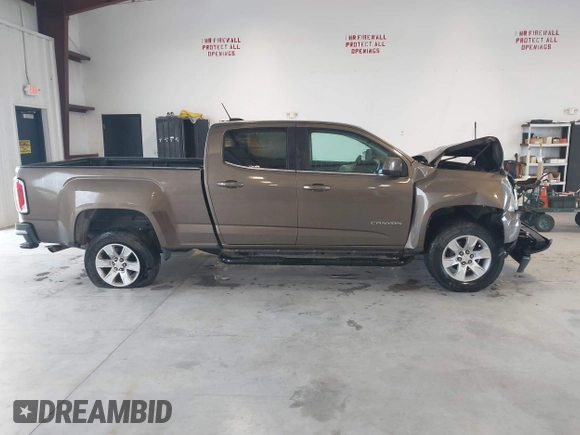 2015 GMC Canyon 2WD SLE with VIN 1GTG5BE31F1166383, listed as a IAAI auction lot 41640378 with 334,016 mi miles. Bid and sale history available at carsss.com. Image 13.