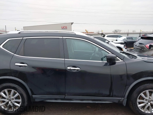 2017 Nissan Rogue SV with VIN KNMAT2MV5HP604465, listed as a IAAI auction lot 41463706 with 103,942 mi miles. Bid and sale history available at carsss.com. Image 13.