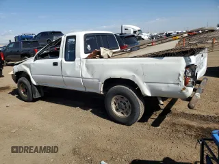 1991 Toyota Pickup DLX z VIN JT4VN13D4M5065504, wystawiony jako Copart lot #54058595 z przebiegiem 108 782 mil mil oraz Tytuł czysty. Historia ofert i sprzedaży dostępna na DreamBid. Obrazek 2.