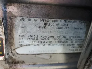 2006 Chevrolet Aveo LT z VIN KL1TG56616B622337, wystawiony jako Copart lot #41756105 z przebiegiem 243 187 mil mil oraz Szkoda całkowita • Salvage title. Historia ofert i sprzedaży dostępna na DreamBid. Obrazek 13.