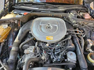 1988 Mercedes-Benz 560 with VIN WDBCA39D0JA410101, listed as a Copart auction lot 78961194 with 247,459 mi miles and Clean Title. Bid and sale history available at DreamBid. Image 7.