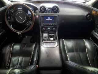 2014 Jaguar XJ with VIN SAJWA1CZ0E8V61168, listed as a Copart auction lot 54383215 with 137,724 mi miles and Salvage Title. Bid and sale history available at DreamBid. Image 8.