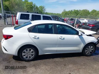 2022 Kia Rio S with VIN 3KPA24AD7NE492807, listed as a IAAI auction lot 42050520 with 100,756 mi miles. Bid and sale history available at carsss.com. Image 14.