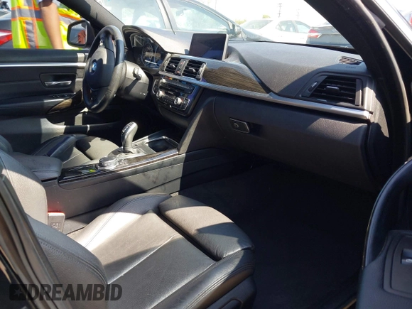 2016 BMW 4 Series 428i xDrive z VIN WBA4C9C58GG141210, wystawiony jako IAAI lot #42218036 z przebiegiem 88 864 mil mil oraz . Historia ofert i sprzedaży dostępna na DreamBid. Obrazek 5.