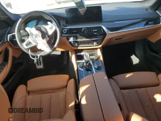 2023 BMW 5 Series 530e with VIN WBA13AG02PCL73814, listed as a Copart auction lot 86818824 with Not provided miles and Salvage title. Bid and sale history available at DreamBid. Image 8.