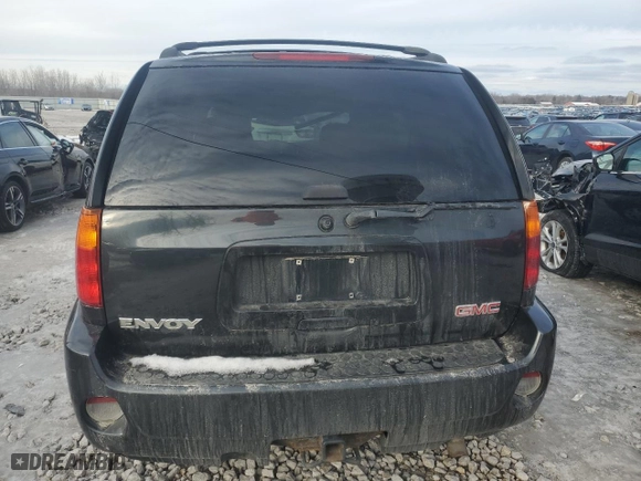 2005 GMC Envoy Denali with VIN 1GKET63M652353972, listed as a Copart auction lot 43690635 with 113,630 mi miles and Clean Title. Bid and sale history available at carsss.com. Image 6.