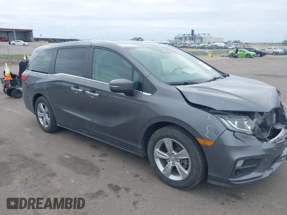 2018 Honda Odyssey EX-L z VIN 5FNRL6H72JB090127, wystawiony jako IAAI lot #42167788 z przebiegiem 114 984 mil mil oraz . Historia ofert i sprzedaży dostępna na DreamBid. Obrazek 1.