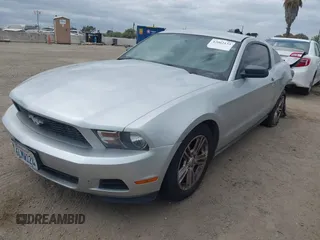 2010 Ford Mustang V6 with VIN 1ZVBP8AN1A5104611, listed as a IAAI auction lot 42062133 with 149,503 mi miles and . Bid and sale history available at DreamBid. Image 2.