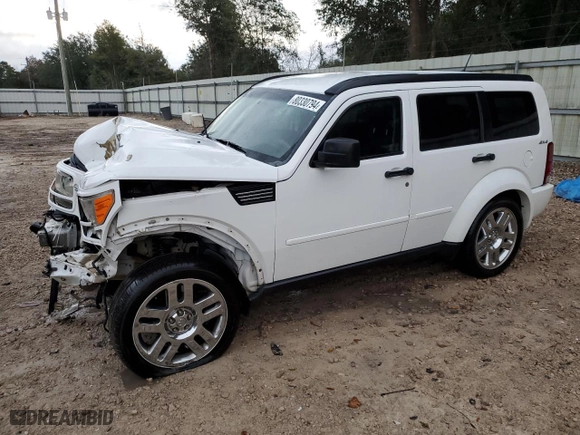 2011 Dodge Nitro Heat with VIN 1D4PU4GK2BW604993, listed as a Copart auction lot 80330794 with 168,934 mi miles and Salvage Title. Bid and sale history available at carsss.com. Image 1.