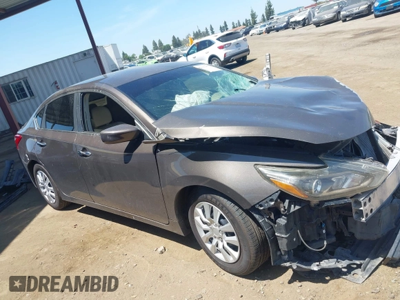 2016 Nissan Altima S z VIN 1N4AL3AP2GN313918, wystawiony jako IAAI lot #42193079 z przebiegiem 111 007 mil mil oraz . Historia ofert i sprzedaży dostępna na DreamBid. Obrazek 14.