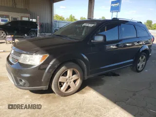 2012 Dodge Journey SXT с VIN 3C4PDCCG0CT305194, выставлен на аукционе Copart как лот 68478214 с пробегом 194 533 миль миль и Списание • Salvage title. История ставок и продаж доступна на DreamBid. Изображение 1.