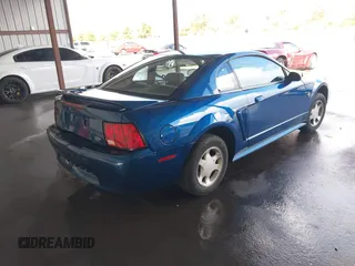 1999 Ford Mustang with VIN 1FAFP4040XF124637, listed as a IAAI auction lot 41793662 with 54,591 mi miles and . Bid and sale history available at DreamBid. Image 4.