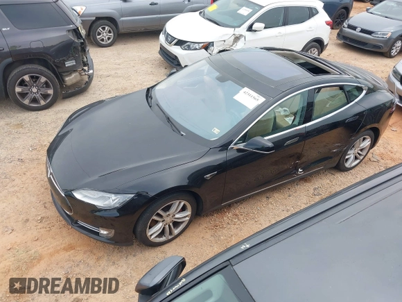 2014 Tesla Model S 60 with VIN 5YJSA1H10EFP34137, listed as a IAAI auction lot 42311565 with Not provided miles and . Bid and sale history available at DreamBid. Image 18.