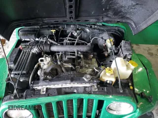 1998 Jeep Wrangler Sahara z VIN 1J4FY49S6WP730035, wystawiony jako Copart lot #59100505 z przebiegiem 225 354 mil mil oraz Szkoda całkowita • Salvage title. Historia ofert i sprzedaży dostępna na DreamBid. Obrazek 11.
