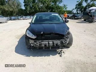 2018 Ford Focus SE z VIN 1FADP3FEXJL256542, wystawiony jako Copart lot #54583915 z przebiegiem 107 774 mil mil oraz Szkoda całkowita • Salvage title. Historia ofert i sprzedaży dostępna na DreamBid. Obrazek 14.