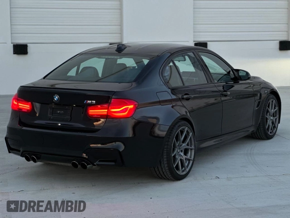 2018 BMW M3 with VIN WBS8M9C51J5K99949, listed as a Copart auction lot 42874973 with 44,383 mi miles. Bid and sale history available at carsss.com. Image 3.
