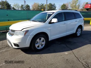 2012 Dodge Journey SXT z VIN 3C4PDCBG0CT364005, wystawiony jako Copart lot #55636265 z przebiegiem 150 048 mil mil oraz Szkoda całkowita • Salvage title. Historia ofert i sprzedaży dostępna na DreamBid. Obrazek 1.