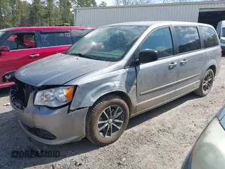 2015 Dodge Grand Caravan American Value with VIN 2C4RDGBG6FR576897, listed as a IAAI auction lot 41780897 with 159,823 mi miles and . Bid and sale history available at DreamBid. Image 2.