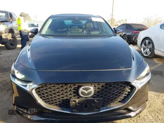 2020 Mazda 3 Premium with VIN 3MZBPAEM2LM124405, listed as a IAAI auction lot 41478818 with 72,551 mi miles and . Bid and sale history available at DreamBid. Image 13.