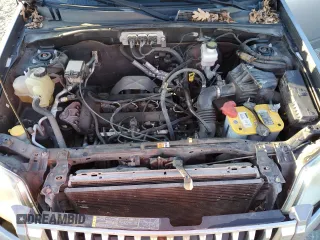 2008 Mercury Mariner with VIN 4M2CU81Z28KJ34614, listed as a Copart auction lot 85657144 with 150,624 mi miles and Salvage title. Bid and sale history available at DreamBid. Image 14.
