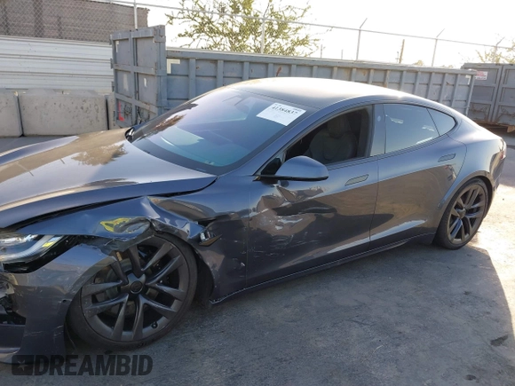 2021 Tesla Model S Long Range with VIN 5YJSA1E53MF436865, listed as a IAAI auction lot 41384837 with 20,829 mi miles and . Bid and sale history available at DreamBid. Image 6.