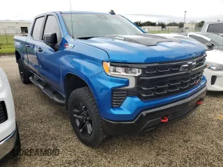 2023 Chevrolet Silverado 1500 LT Trail Boss with VIN 3GCUDFE89PG291160, listed as a Copart auction lot 74374664 with 5,757 mi miles and Salvage Title. Bid and sale history available at DreamBid. Image 4.