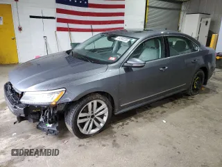 2017 Volkswagen Passat SE z VIN 1VWGT7A3XHC065159, wystawiony jako Copart lot #54590235 z przebiegiem 143 696 mil mil oraz Szkoda całkowita • Salvage title. Historia ofert i sprzedaży dostępna na DreamBid. Obrazek 1.
