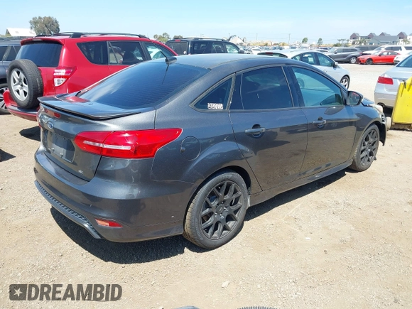 2016 Ford Focus SE with VIN 1FADP3F21GL268058, listed as a IAAI auction lot 42053944 with 103,785 mi miles and . Bid and sale history available at DreamBid. Image 4.