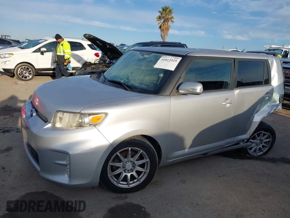 2013 Scion xB with VIN JTLZE4FE2DJ047490, listed as a IAAI auction lot 41812925 with 154,191 mi miles. Bid and sale history available at carsss.com. Image 2.