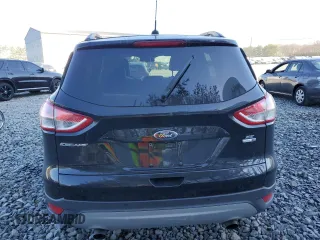 2016 Ford Escape SE with VIN 1FMCU9GX4GUC04677, listed as a Copart auction lot 53531765 with 88,355 mi miles and Salvage Title. Bid and sale history available at carsss.com. Image 6.