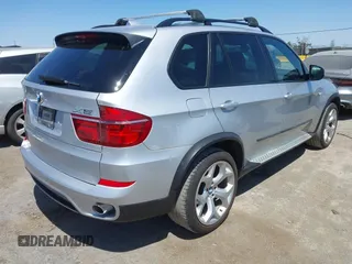 2012 BMW X5 35d with VIN 5UXZW0C58CL671141, listed as a IAAI auction lot 42644381 with 127,464 mi miles and . Bid and sale history available at DreamBid. Image 4.