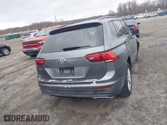 2019 Volkswagen Tiguan S with VIN 3VV0B7AX1KM046808, listed as a IAAI auction lot 41911225 with 62,972 mi miles and . Bid and sale history available at DreamBid. Image 16.