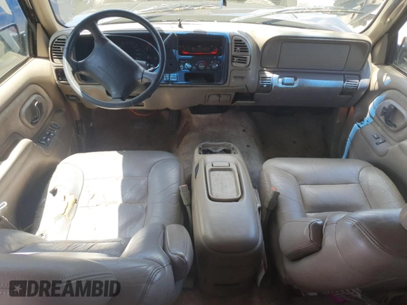 1997 GMC Suburban with VIN 3GKFK16R4VG518331, listed as a Copart auction lot 56241425 with 265,201 mi miles and Non repairable. Bid and sale history available at DreamBid. Image 8.