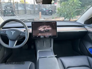 2023 Tesla Model 3 with VIN 5YJ3E1EA1PF607137, listed as a Copart auction lot 62613375 with 27,271 mi miles and Clean title. Bid and sale history available at DreamBid. Image 9.